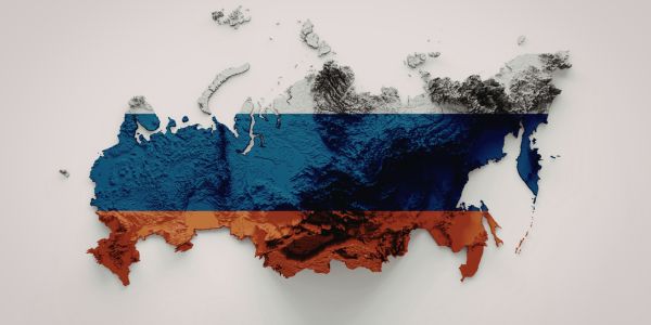 Map of Russia overlaid with the Russian national flag